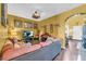 Comfortable living room with large sofa, TV, and arched entryway at 176 Oak Green Dr, Lawrenceville, GA 30044