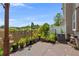 Back patio area featuring various plants and garden decorations at 176 Oak Green Dr, Lawrenceville, GA 30044