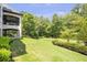 This home features a great back yard, a covered back porch, and wooded privacy at 4317 Oglethorpe Nw Loop, Acworth, GA 30101