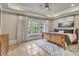 Relax in this primary bedroom with decorative tray ceiling, neutral paint, and a gorgeous window view at 4317 Oglethorpe Nw Loop, Acworth, GA 30101