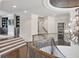 A view of the open concept foyer featuring dark wood stairs with a light colored staircase at 4317 Oglethorpe Nw Loop, Acworth, GA 30101