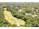 Aerial view of a lush golf course community surrounded by mature trees and beautiful luxury homes at 4317 Oglethorpe Nw Loop, Acworth, GA 30101