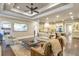 Spacious living room featuring hardwood floors, recessed lighting, and comfortable seating arrangement at 4317 Oglethorpe Nw Loop, Acworth, GA 30101