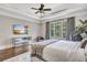 This main bedroom features a decorative ceiling, dark wood floors, and an entertainment center at 4317 Oglethorpe Nw Loop, Acworth, GA 30101