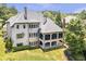 A partial aerial view shows the backyard and screened porch of this two-story home at 4317 Oglethorpe Nw Loop, Acworth, GA 30101
