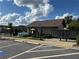 Community pool area with lounge chairs, umbrellas, and mailboxes at 1452 Ridgebend Se Way, Mableton, GA 30126