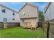 Fenced backyard with a wooden deck and green grass perfect for entertaining at 639 Ira Sw St, Atlanta, GA 30312