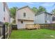 Fenced backyard with a wooden deck and grassy area, ideal for outdoor enjoyment at 639 Ira Sw St, Atlanta, GA 30312