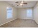 Bright bedroom with ample natural light, carpeted floors, and a closet provides a comfortable retreat at 639 Ira Sw St, Atlanta, GA 30312