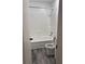 Bathroom featuring a tub and shower combination and a white toilet at 1120 Brandon Hill Way, Jonesboro, GA 30238