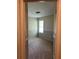 Bedroom with carpeting, a window, and two-tone painted walls at 1120 Brandon Hill Way, Jonesboro, GA 30238