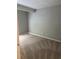 Bedroom with tan carpet and neutral colored walls at 1120 Brandon Hill Way, Jonesboro, GA 30238