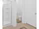 A clean white bathroom features a stand up shower and a toilet at 2703 Jordan Ln, Lithia Springs, GA 30122