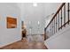 Bright foyer with high ceilings, stylish decor, and hardwood floors at 2703 Jordan Ln, Lithia Springs, GA 30122