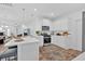 Modern kitchen with a center island, open layout, and stainless steel appliances at 2703 Jordan Ln, Lithia Springs, GA 30122