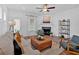 Inviting living room with a cozy fireplace, sofa and stylish decor at 2703 Jordan Ln, Lithia Springs, GA 30122