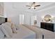 Serene primary bedroom featuring a dresser, soft lighting and a doorway at 2703 Jordan Ln, Lithia Springs, GA 30122