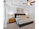 Comfortable primary bedroom with a fan and neutral decor at 2703 Jordan Ln, Lithia Springs, GA 30122