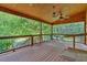Enjoy the view from this back deck overlooking a beautiful treed property at 3122 Harmony Rd, Temple, GA 30179
