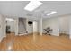 Finished basement features hardwood floors, stairs, and adjacent bathroom at 3122 Harmony Rd, Temple, GA 30179