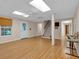 Large finished basement has hardwood floors, a staircase, and a utility closet at 3122 Harmony Rd, Temple, GA 30179
