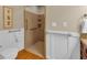 Accessible bathroom featuring a walk-in shower with grab bars at 3122 Harmony Rd, Temple, GA 30179