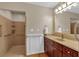 Accessible bathroom featuring a walk-in shower with grab bars and neutral design at 3122 Harmony Rd, Temple, GA 30179