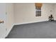 Bonus room with gray carpet, window and neutral walls at 3122 Harmony Rd, Temple, GA 30179