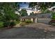 Charming single-story home with a well-manicured lawn and a two-car garage at 3122 Harmony Rd, Temple, GA 30179