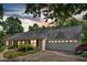 Charming home featuring a well-manicured front yard and a convenient two-car garage at 3122 Harmony Rd, Temple, GA 30179
