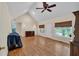 Bright living room with hardwood floors, vaulted ceilings, and neutral paint at 3122 Harmony Rd, Temple, GA 30179