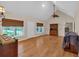 Light-filled living room featuring hardwood floors, high ceilings, and neutral color scheme at 3122 Harmony Rd, Temple, GA 30179