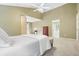 Spacious bedroom with high ceilings and a queen-sized bed, a vanity table and an ensuite bath at 4138 Glenlake Nw Ter, Kennesaw, GA 30144
