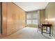 Bedroom featuring a large wardrobe, a makeup vanity, and a window with natural light at 4138 Glenlake Nw Ter, Kennesaw, GA 30144