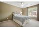Inviting bedroom with plush carpet, neutral walls, and an abundance of natural light at 4138 Glenlake Nw Ter, Kennesaw, GA 30144
