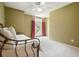 Cozy bedroom featuring a wrought iron daybed and bright window at 4138 Glenlake Nw Ter, Kennesaw, GA 30144