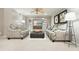 Cozy living room featuring neutral walls, light carpet, built-in shelving, and modern decor at 4138 Glenlake Nw Ter, Kennesaw, GA 30144