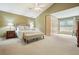 Spacious main bedroom boasts vaulted ceilings, and ample natural light at 4138 Glenlake Nw Ter, Kennesaw, GA 30144