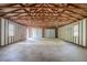 Large garage with two doors and concrete floor at 45 Kelsey Way, Palmetto, GA 30268