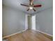 Neutral paint colors and updated flooring highlight this bedroom, complete with a ceiling fan and trim at 1024 Regis Rd, Atlanta, GA 30315