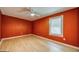 Bedroom featuring neutral toned floor, ceiling fan, and natural light from the window at 1024 Regis Rd, Atlanta, GA 30315