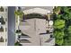 Aerial view of a townhome featuring an outdoor patio with seating and a fire pit at 117 Via Roma, Woodstock, GA 30188
