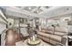 Open-concept design, seamlessly connecting the living room to a well-appointed kitchen, perfect for gatherings at 117 Via Roma, Woodstock, GA 30188