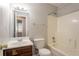 Bathroom with vanity, toilet, and shower-tub combination at 8670 Brandon Hill Ln, Jonesboro, GA 30238