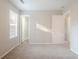 Bedroom featuring neutral carpet, paint, and window at 8670 Brandon Hill Ln, Jonesboro, GA 30238