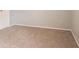 Bedroom featuring neutral carpet and paint with base trim at 8670 Brandon Hill Ln, Jonesboro, GA 30238