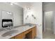 Bright bathroom featuring a double sink vanity, ample counter space, and a separate shower room at 106 Oakhurst Ter, Decatur, GA 30030
