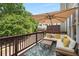 Cozy outdoor deck with comfortable seating and a large umbrella for shade at 106 Oakhurst Ter, Decatur, GA 30030
