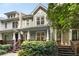 Charming townhome with a welcoming front porch, perfect for enjoying the outdoors at 106 Oakhurst Ter, Decatur, GA 30030