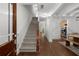Inviting foyer with hardwood floors, staircase, and natural light at 106 Oakhurst Ter, Decatur, GA 30030